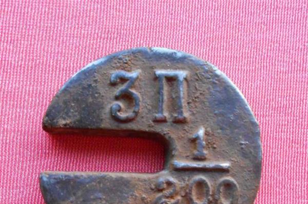 Маленькая плоская гиря фото